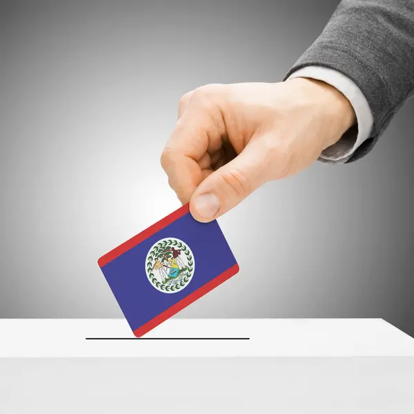 Voting concept - Male inserting flag into ballot box - Belize — Stock Photo, Image