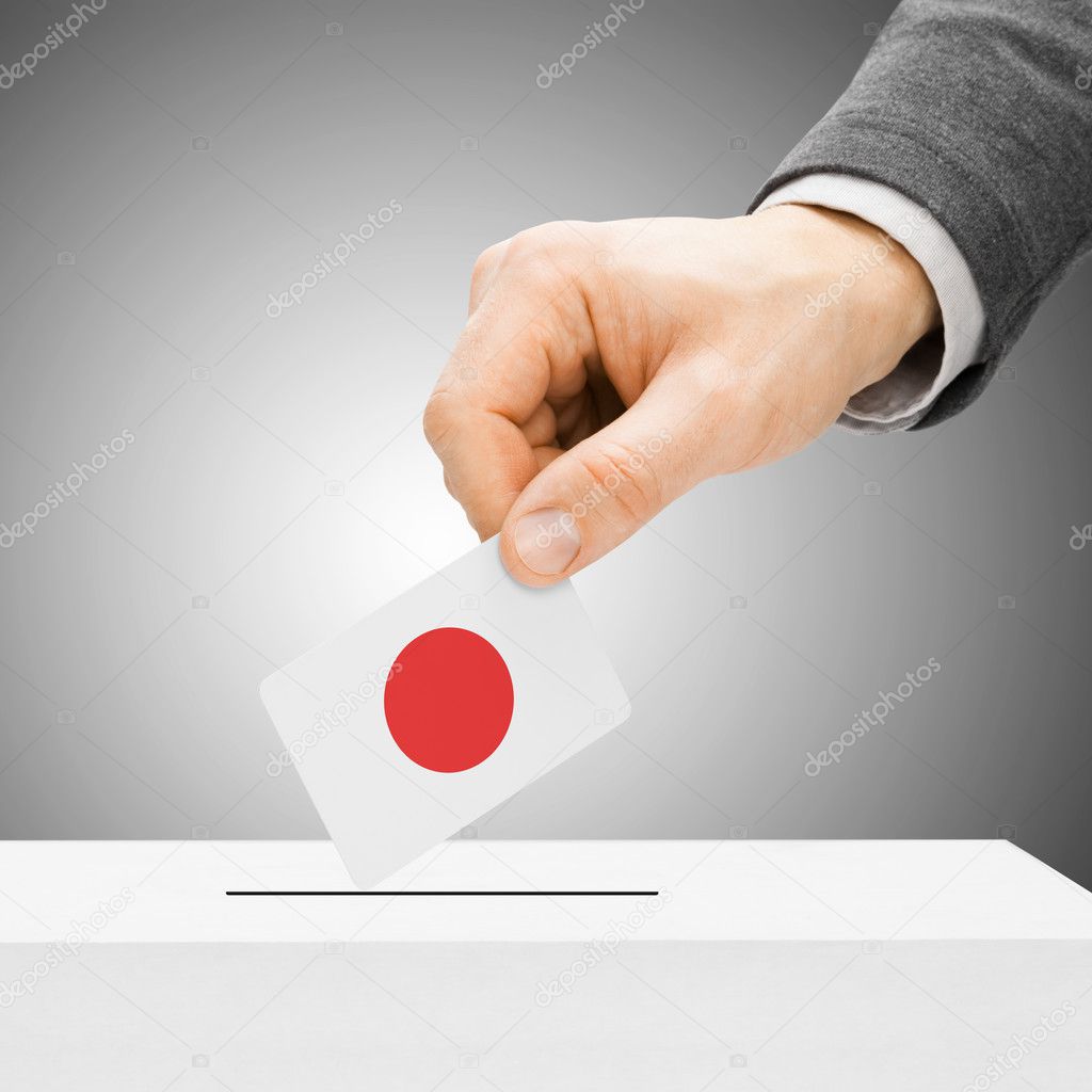 Voting concept - Male inserting flag into ballot box - Japan