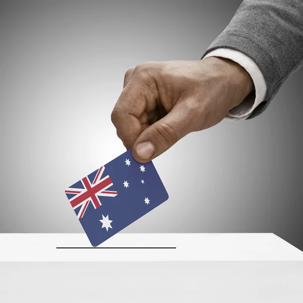 Black male holding flag. Voting concept - Australia — Stock Photo, Image