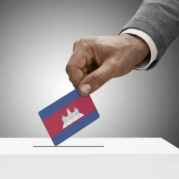 Black male holding flag. Voting concept - Cambodia — Stock Photo, Image