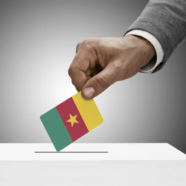 Black male holding flag. Voting concept - Cameroon — Stock Photo, Image