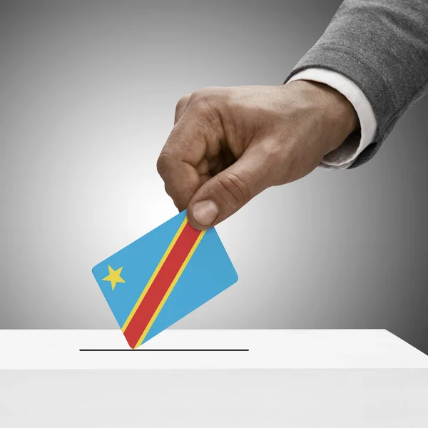 Black male holding flag. Voting concept - Democratic Republic of — Stock Photo, Image