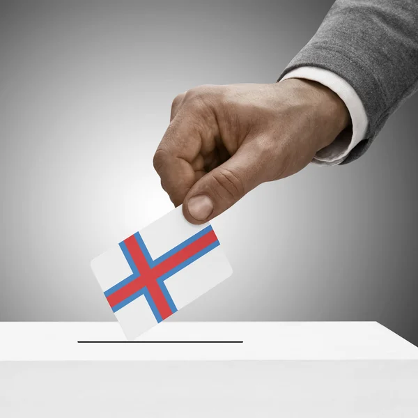 Black male holding flag. Voting concept - Faroe Islands — Stock Photo, Image