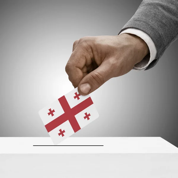 Black male holding flag. Voting concept - Georgia — Stock Photo, Image