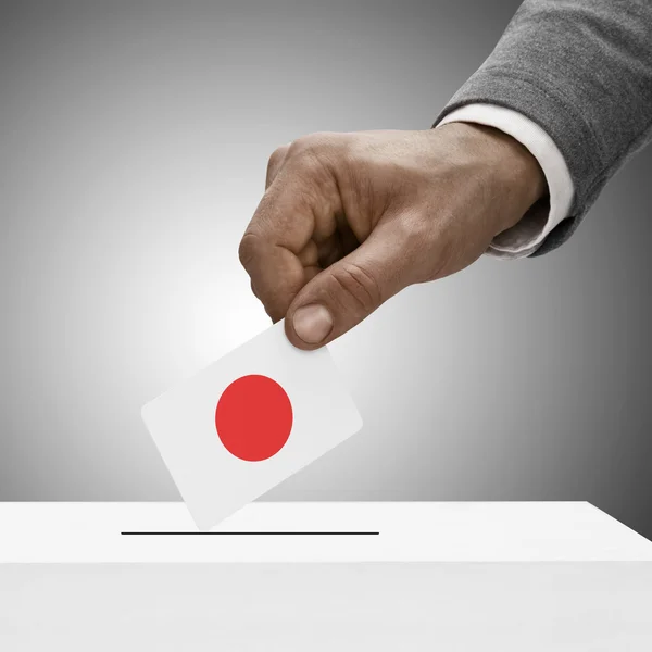 Schwarz männlich mit Flagge. Abstimmung von Konzept - Japan — Stockfoto