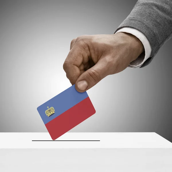 Schwarz männlich mit Flagge. Abstimmung von Konzept - Liechtenstein — Stockfoto