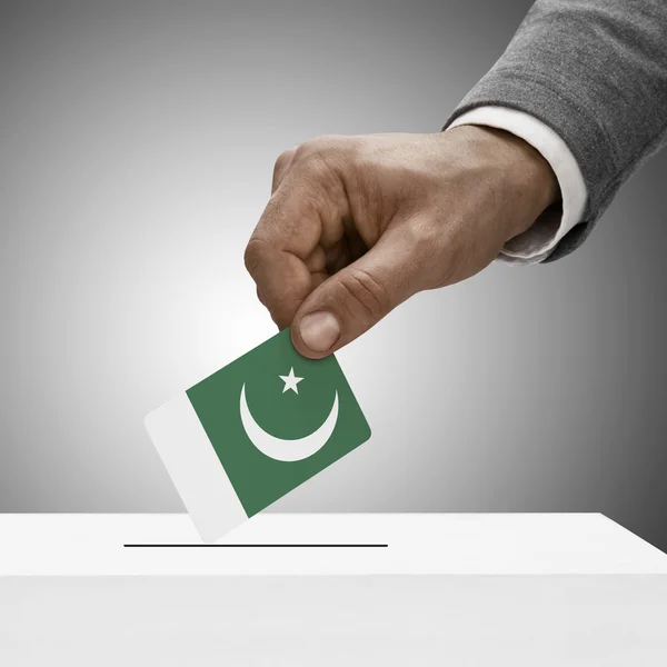 Black male holding flag. Voting concept - Pakistan — Stock Photo, Image
