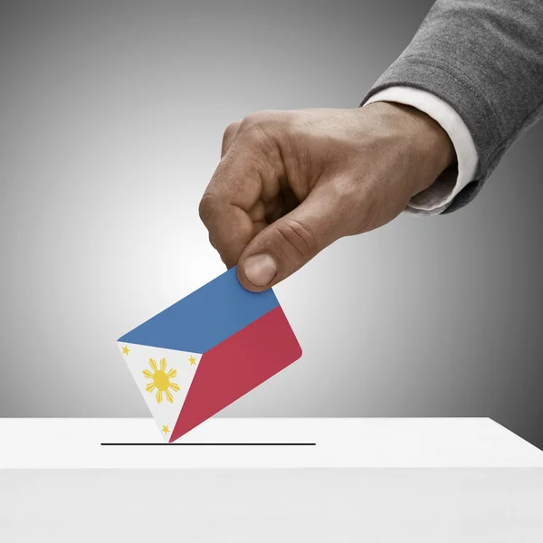 Black male holding flag. Voting concept - Philippines — Stock Photo, Image