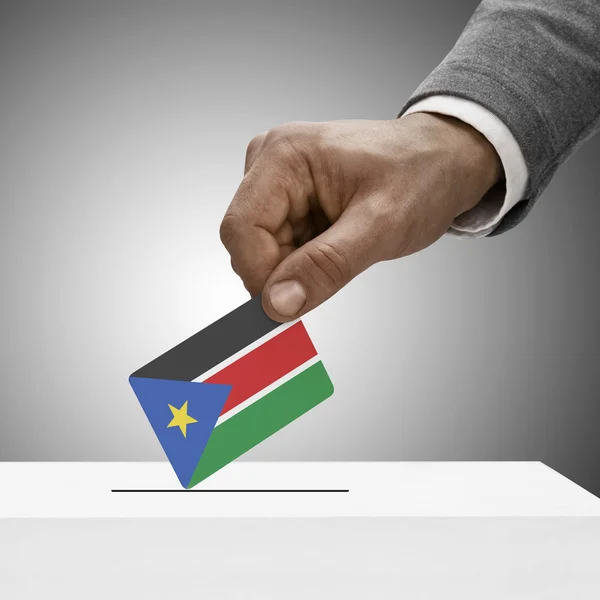 Black male holding flag. Voting concept - South Sudan — Stock Photo, Image
