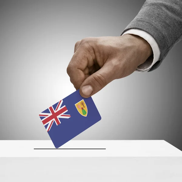 Black male holding flag. Voting concept - Turks and Caicos Islan — Stock Photo, Image