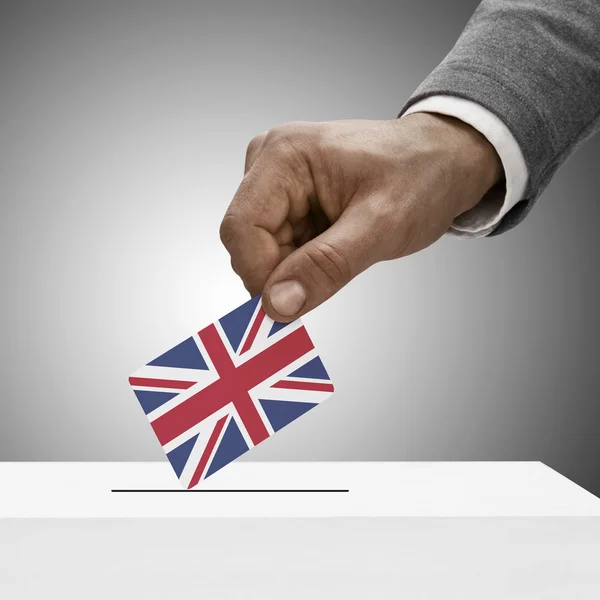 Black male holding flag. Voting concept - United Kingdom — Stock Photo, Image