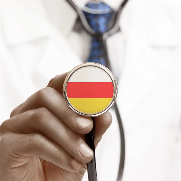 Stethoscope with national flag conceptual series - South Ossetia — Stock Photo, Image