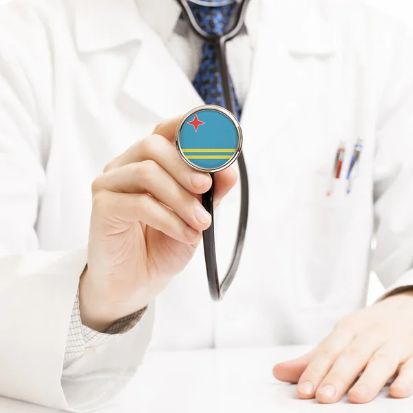 Doctor holding stethoscope with flag series - Aruba — Stock Photo, Image