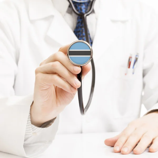 Doctor holding estetoscopio con serie de bandera - Botswana — Foto de Stock