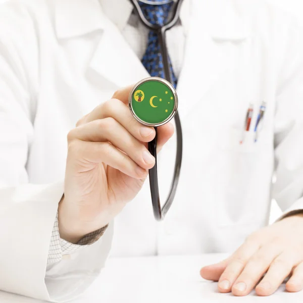 Doctor holding stethoscope with flag series - Cocos (Keeling) Is — Stock Photo, Image