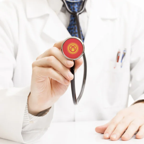 Doctor holding stethoscope with flag series - Kyrgyzstan — Stock Photo, Image