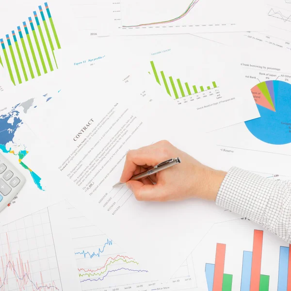 Business man working with financial data - signing contract - studio shot — Stock Photo, Image