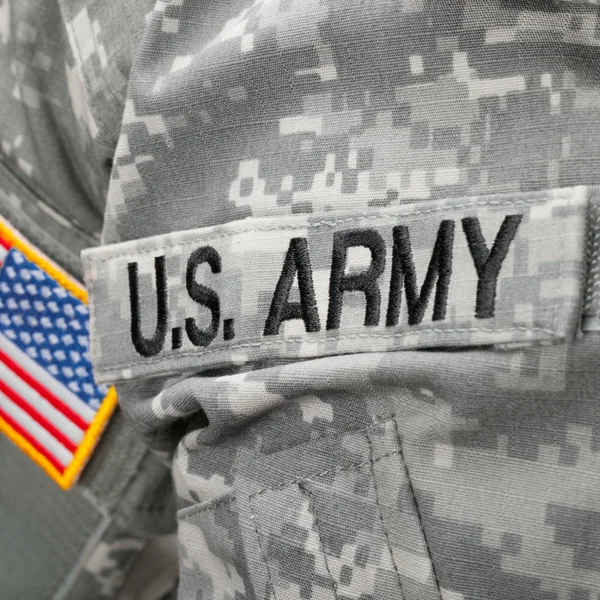 US Army and flag patch on solder's uniform — Stock Photo, Image