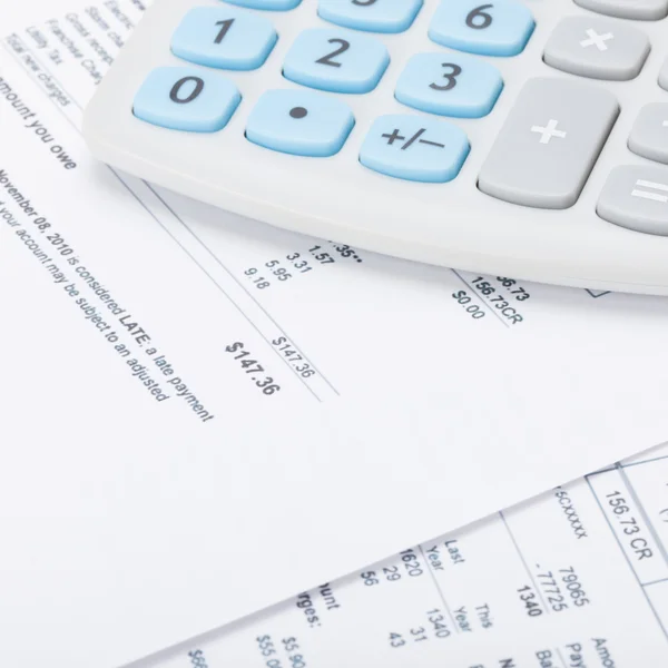 Neat calculator with utility bill - close up shot — Stock Photo, Image