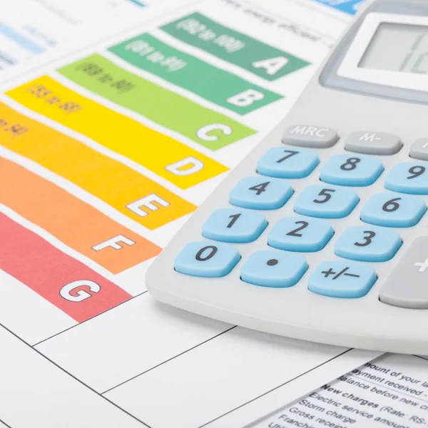 Energy efficiency chart and calculator - close up shot — Stock Photo, Image