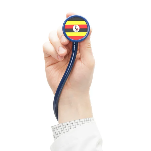 听诊器与国旗系列-乌干达 — 图库照片