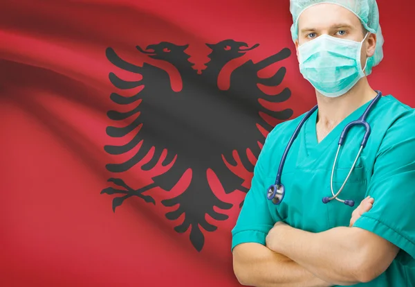 Cirujano con bandera nacional en la serie del fondo - Albania —  Fotos de Stock