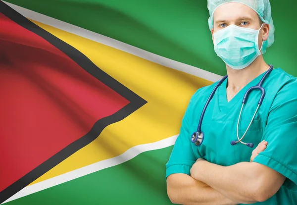 Cirurgião, com a bandeira nacional na série de fundo - Guiana — Fotografia de Stock