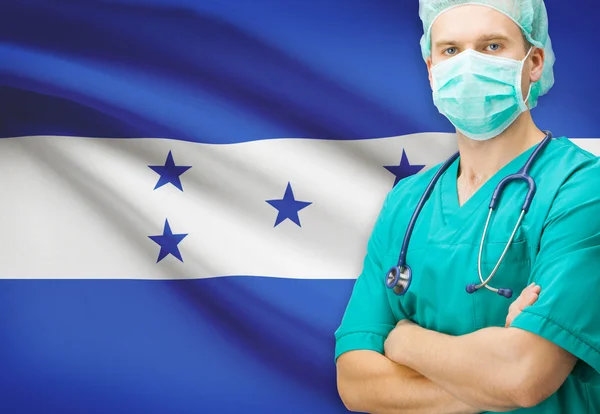 Kirurg med nationella flagga på bakgrunden serien - Honduras — Stockfoto