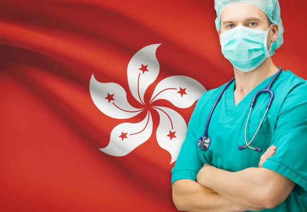 Chirurgo con la bandiera nazionale sulla serie della priorità bassa - Hong Kong — Foto Stock