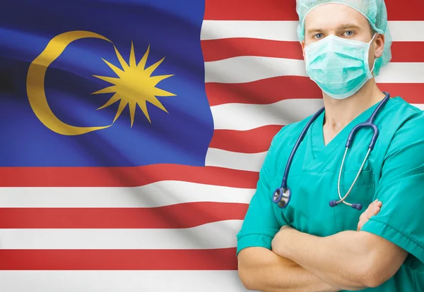 Surgeon with national flag on background series - Malaysia — Stock Photo, Image