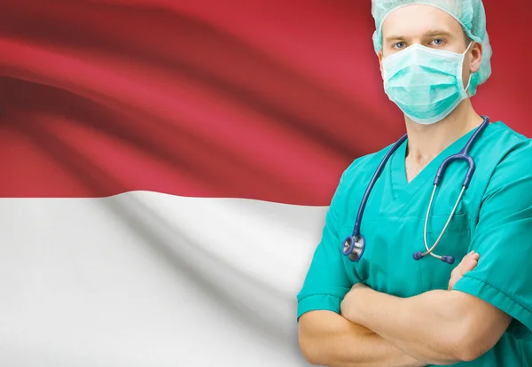 Chirurg met nationale vlag op achtergrond serie - Monaco — Stockfoto