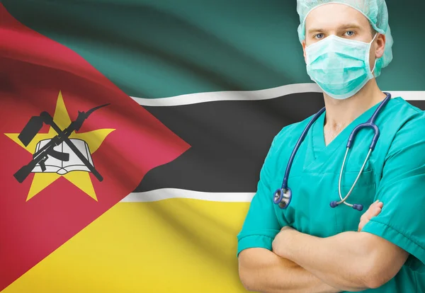 Surgeon with national flag on background series - Mozambique — Stock Photo, Image