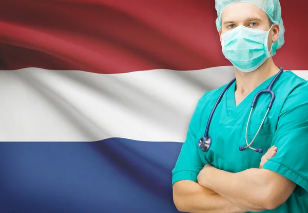 Kirurg med nationella flagga på bakgrunden serien - Nederländerna — Stockfoto