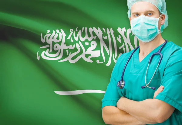 Хирург с национальным флагом на фоне серии - Саудовская Аравия — стоковое фото