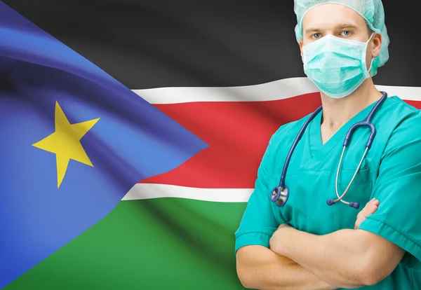 背景シリーズ - 南スーダンの国旗と外科医 — ストック写真