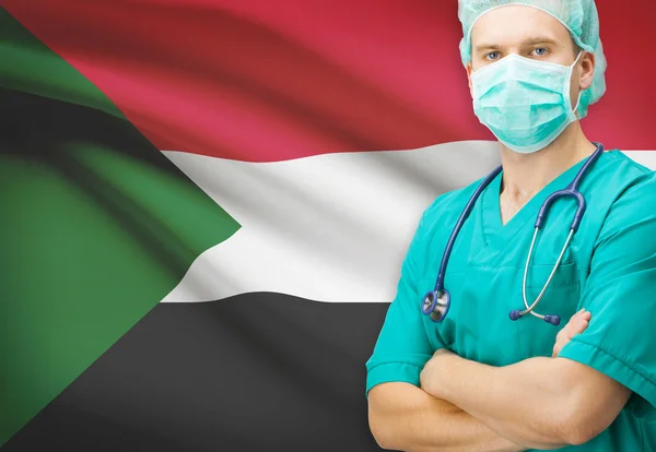 Surgeon with national flag on background series - Sudan — Stock Photo, Image