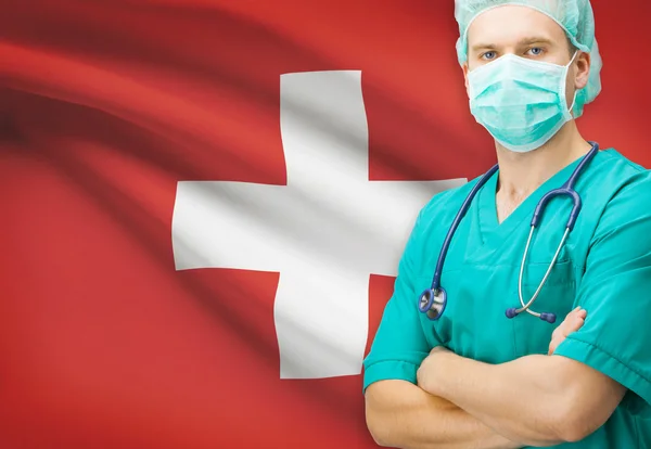 Chirurg z flagi narodowej na tle serii - Szwajcaria — Zdjęcie stockowe