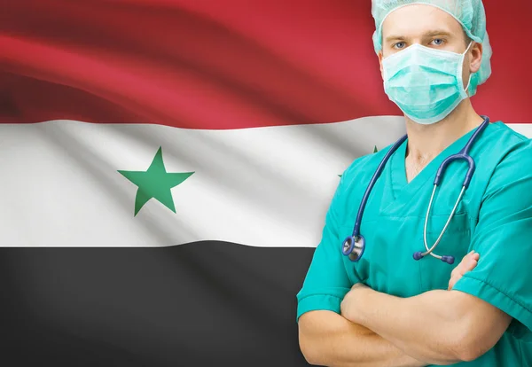 Cirujano con bandera nacional en la serie de fondo - Siria — Foto de Stock