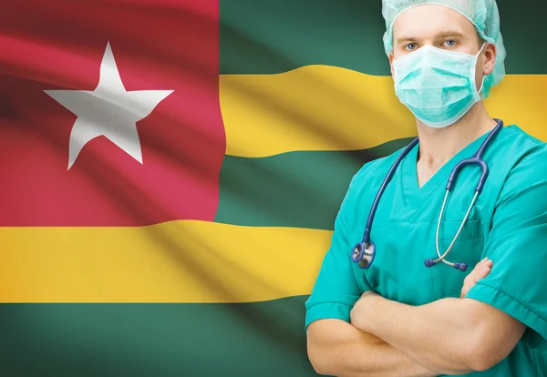 Surgeon with national flag on background series - Togo — Stock Photo, Image