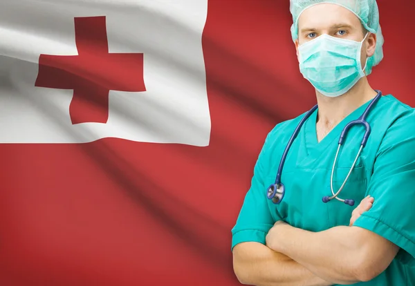 Kirurg med nationella flagga på bakgrunden serien - Tonga — Stockfoto