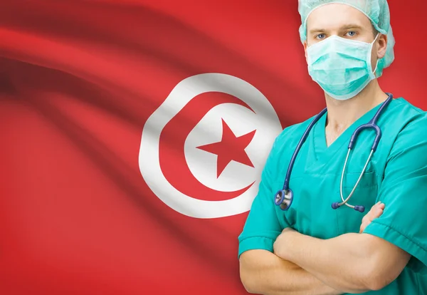 Surgeon with national flag on background series - Tunisia — Stock Photo, Image