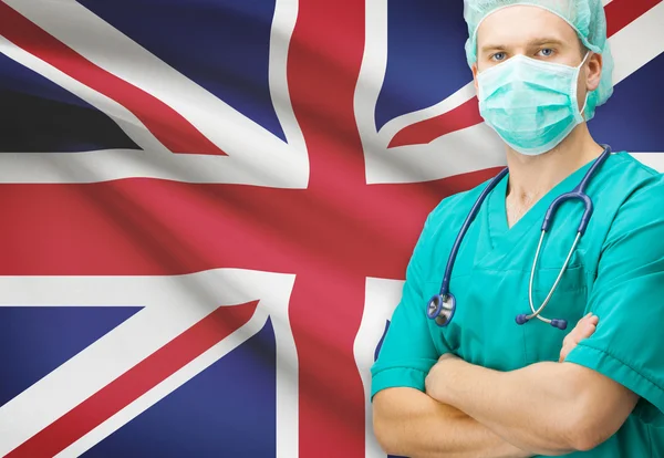 Kirurg med nationella flagga på bakgrunden serien - Storbritannien — Stockfoto