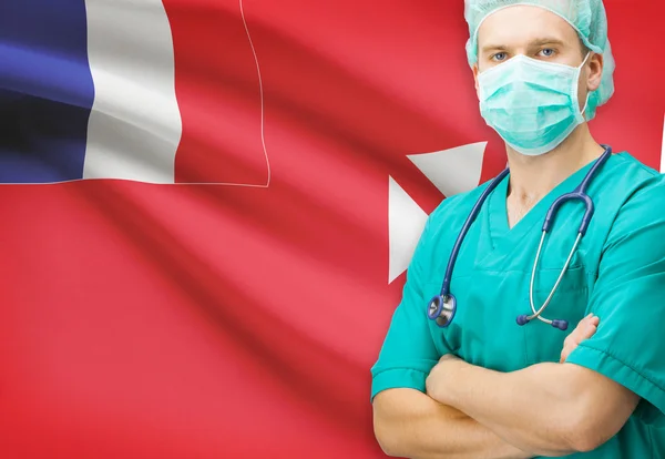 Chirurg s státní vlajka v pozadí řady - Wallis a Futuna — Stock fotografie