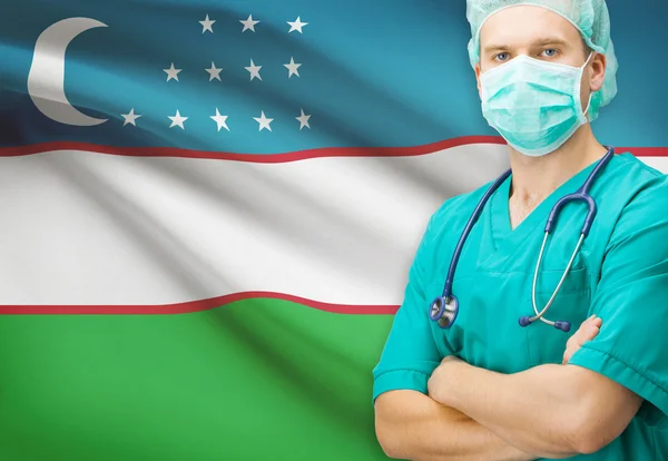 Chirurg mit Nationalflagge auf Hintergrund-Serie - Usbekistan — Stockfoto