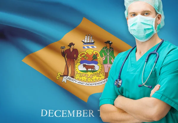 Chirurg met ons staat vlag op achtergrond serie - Delaware — Stockfoto
