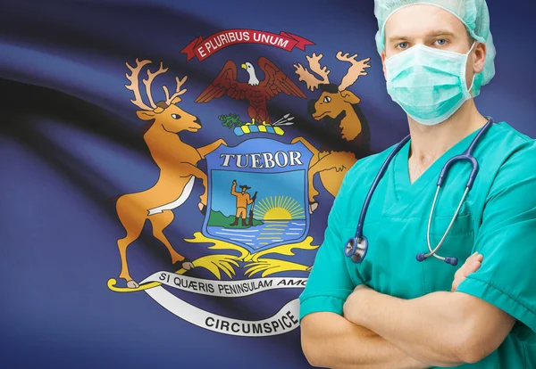 Surgeon with US state flag on background series - Michigan — Stock Photo, Image