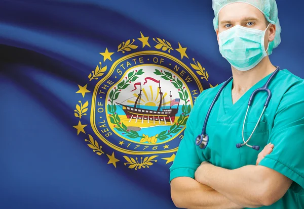 Surgeon with US state flag on background series - New Hampshire — Stock Photo, Image