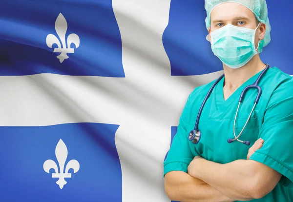 Cirujano con bandera canadiense privinces en serie de fondo - Quebec — Foto de Stock