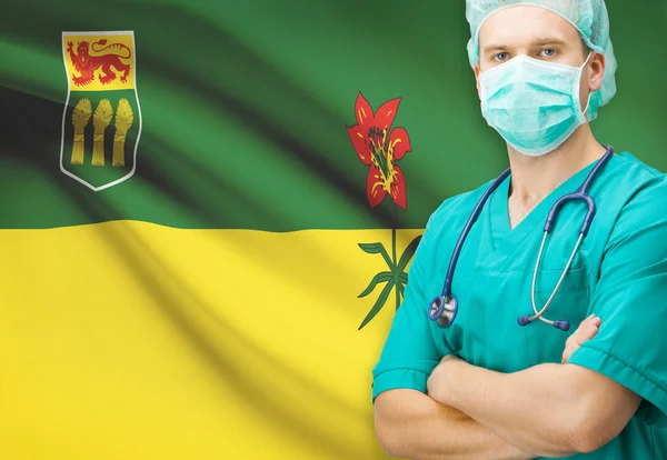 Хирург с канадской privinces флаг на фоне серии - Саскачеван — стоковое фото