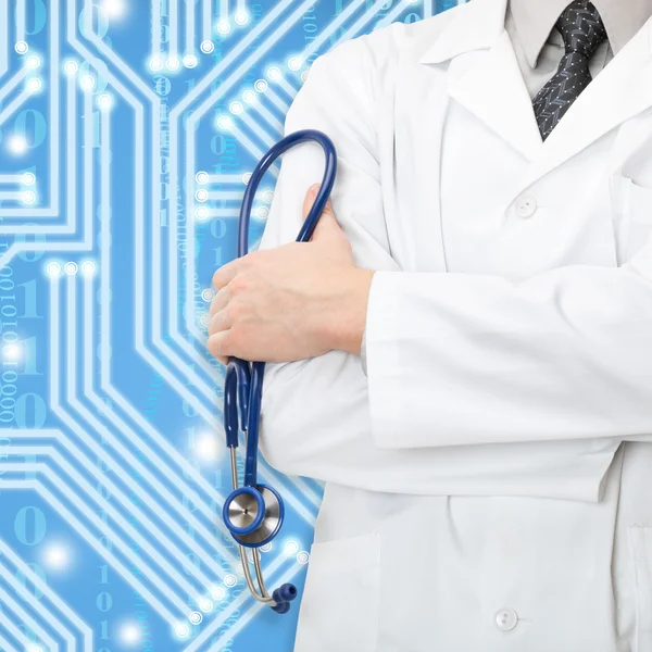 Medical doctor with stethoscope in hand and blue circuit on background — Stock Photo, Image